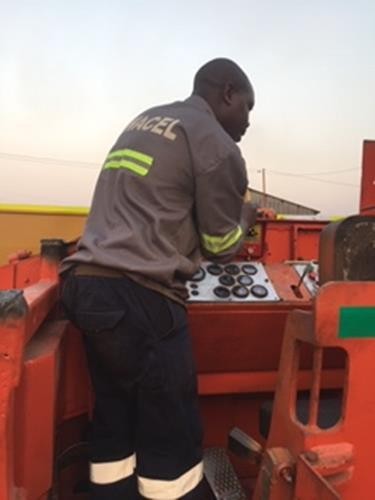 Wacel technician working on mobile-equipment fire protection